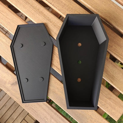 Coffin planter and matching tray separated, drainage system detail