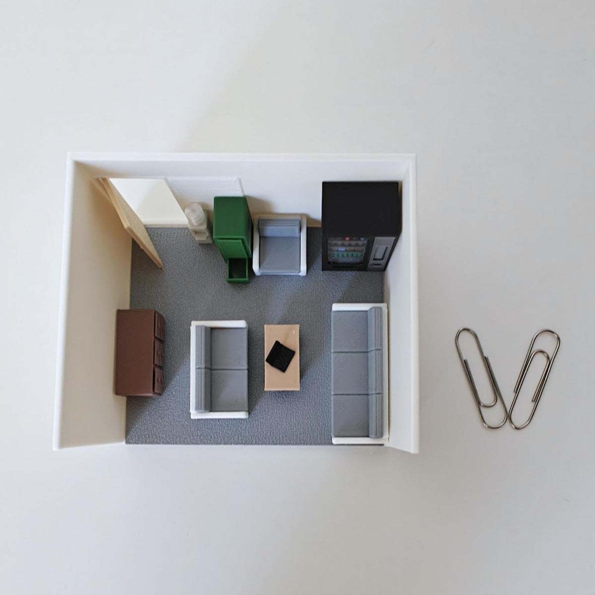 Mini office and living room diorama scene with sofa furniture and accessories