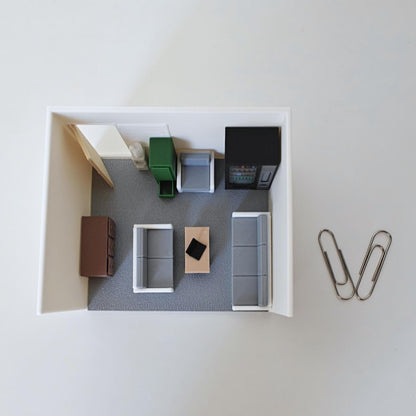 Mini office and living room diorama scene with sofa furniture and accessories
