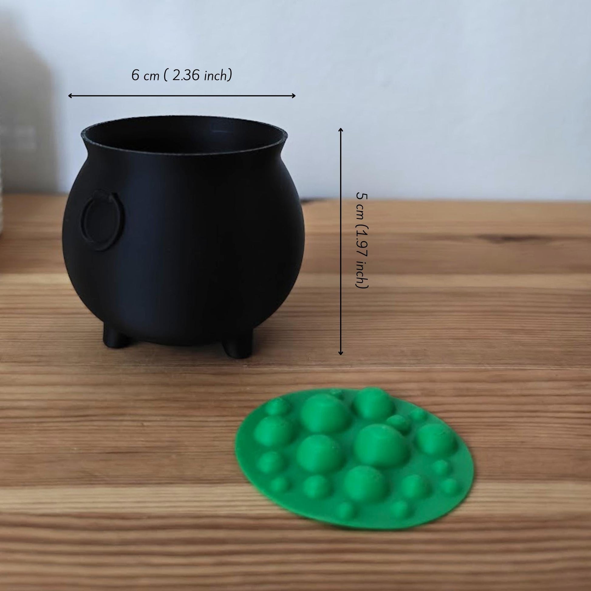 Image showing product dimensions, with cauldron and removable green bubble insert displayed separately.