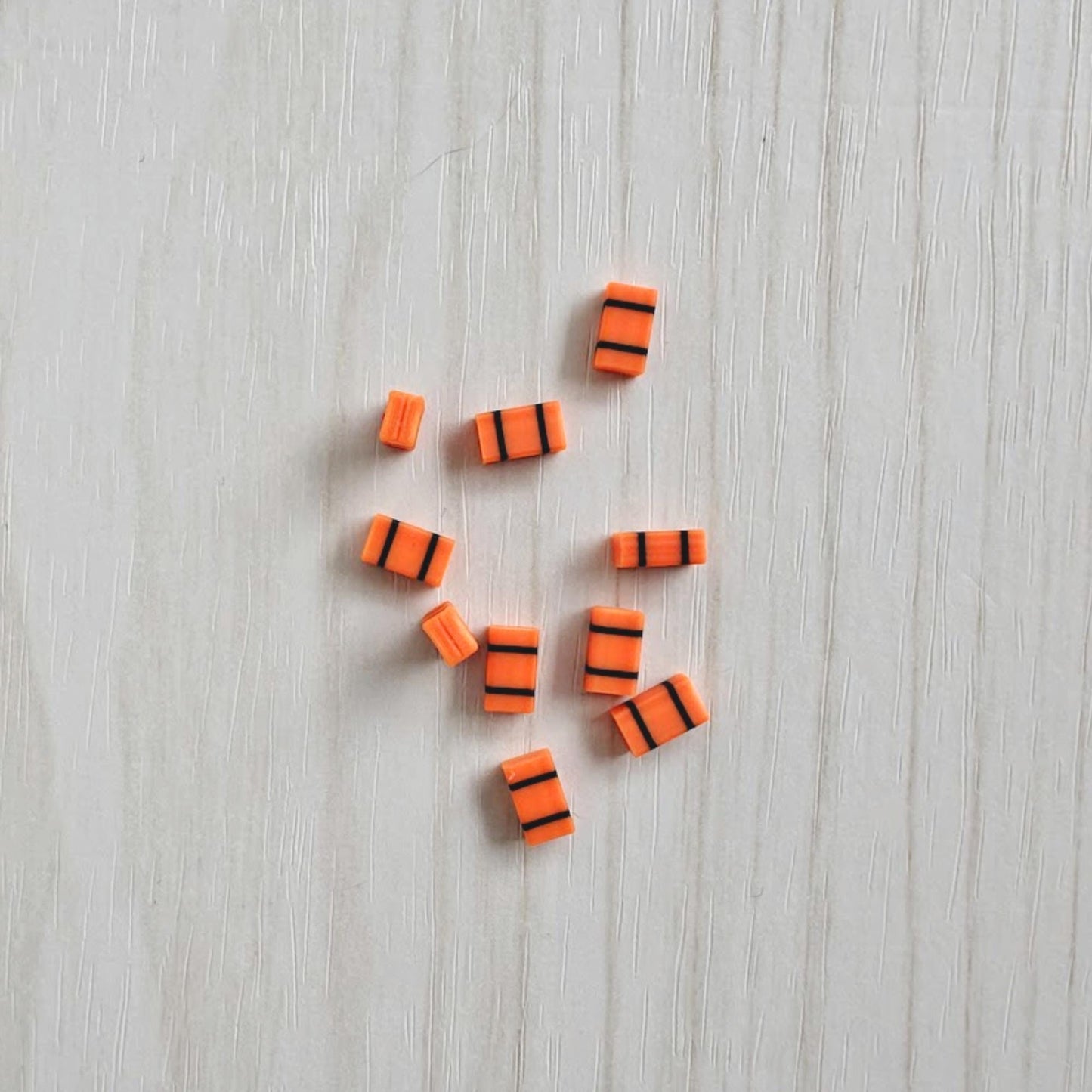 Miniature orange medical bags in 1/64 scale for fire truck diorama accessories