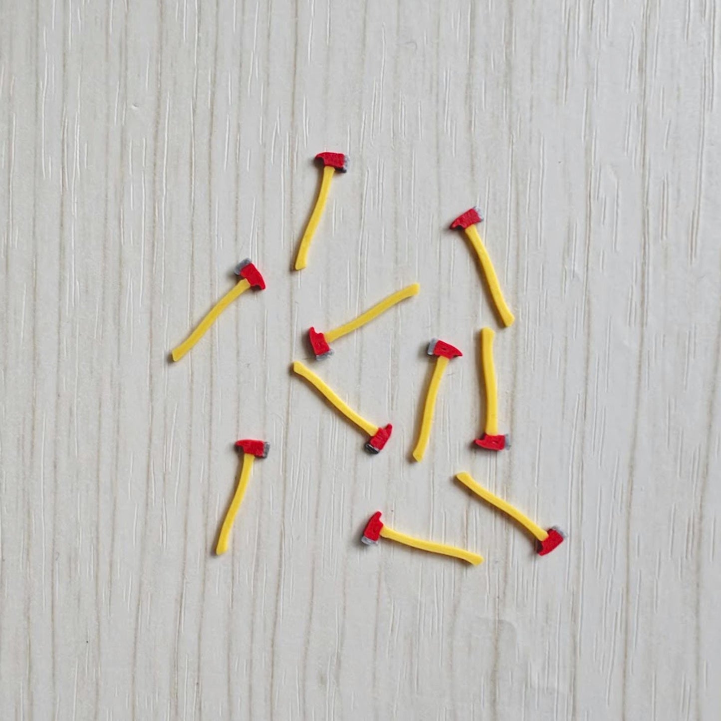 Miniature axes in 1/64 scale for fire truck diorama accessories