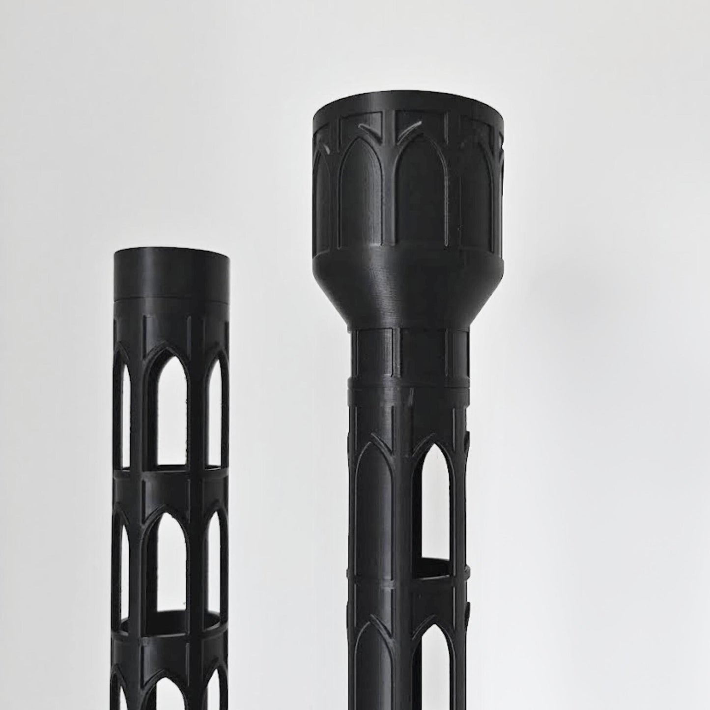 Close-up view of the 4 cm gothic moss pole sections, showing the open cutout pattern and solid reservoir top.