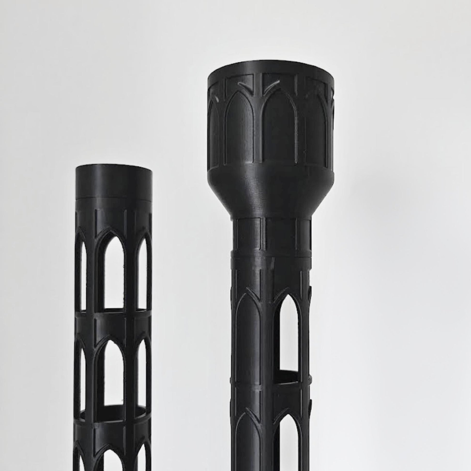 Close-up view of the 4 cm gothic moss pole sections, showing the open cutout pattern and solid reservoir top.