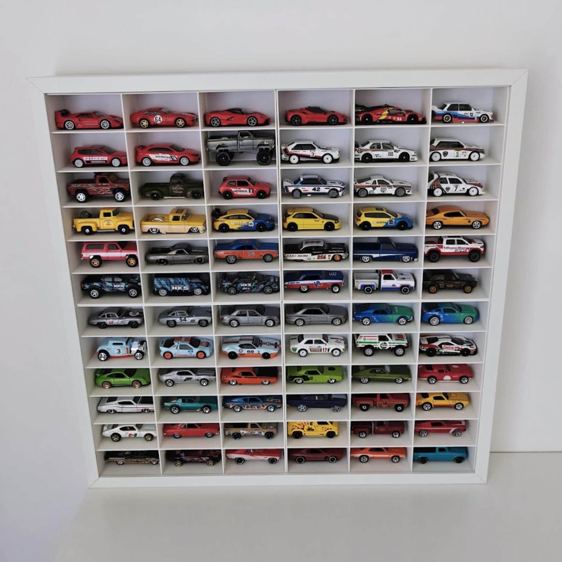 Front view of Sannahed frame filled with 1:64 scale cars in organized grid display