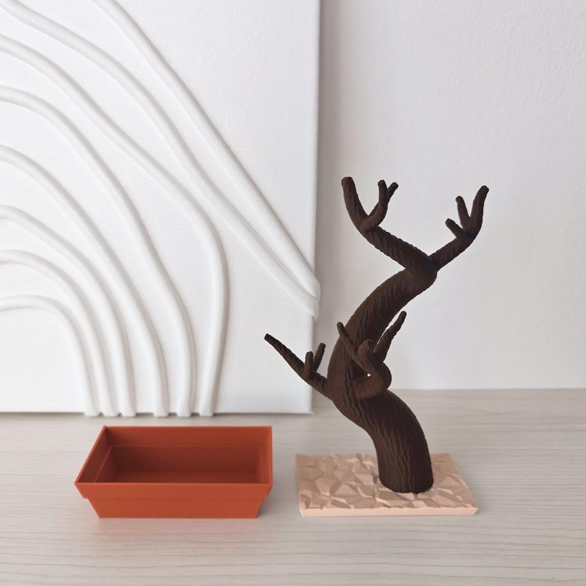 Bonsai holder components partially assembled with tree placed in base