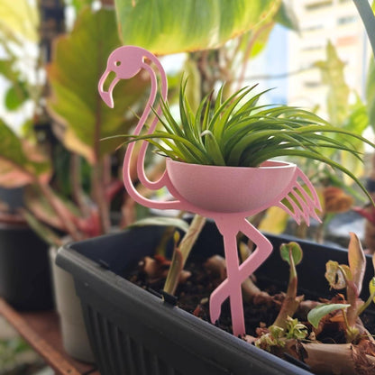 Flamingo air plant holder used in plant pot with Tillandsia
