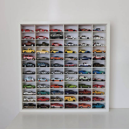 White IKEA Sannahed frame with 72 Hot Wheels cars displayed in grid insert on a shelf