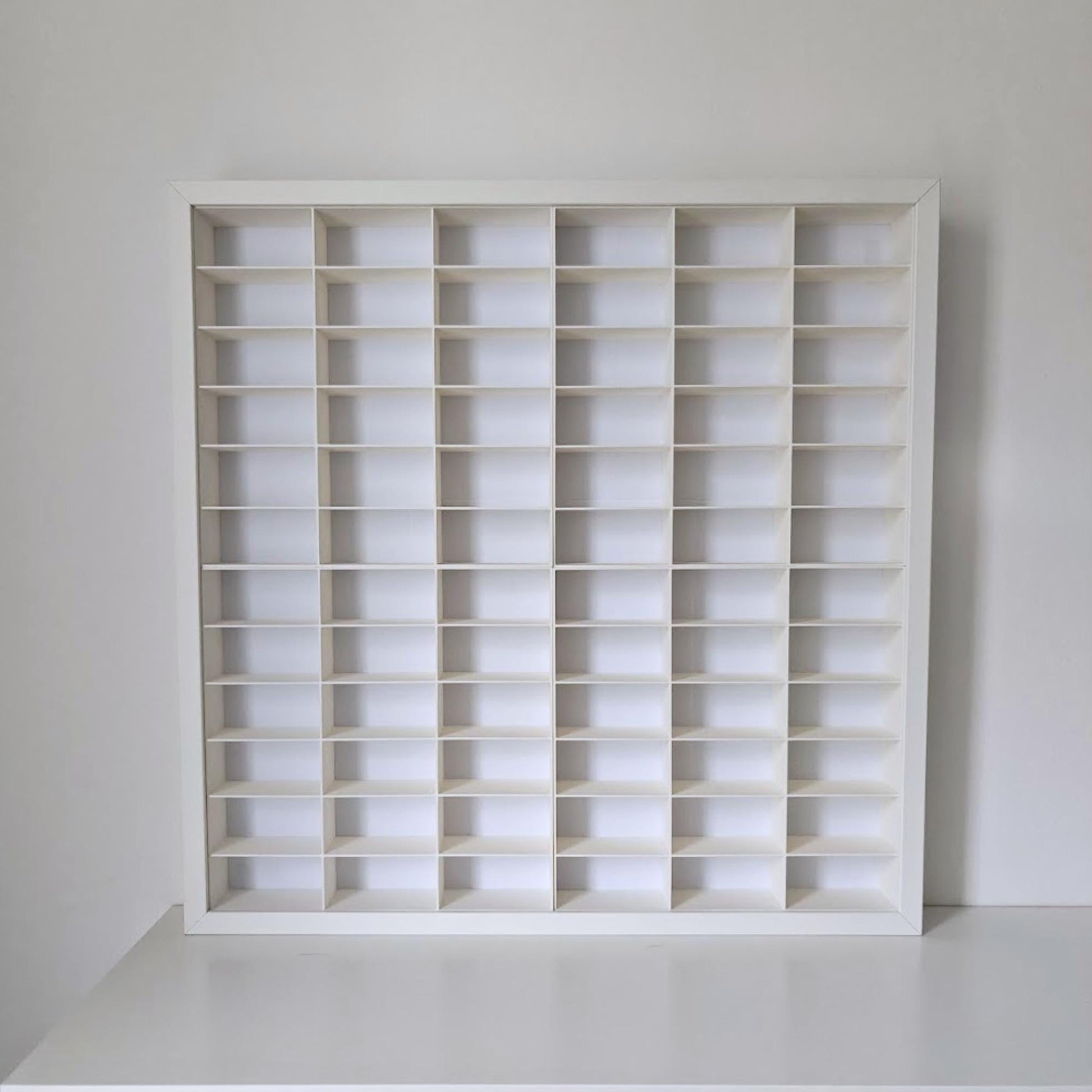 Empty white grid insert for IKEA Sannahed frame showing 72 compartments