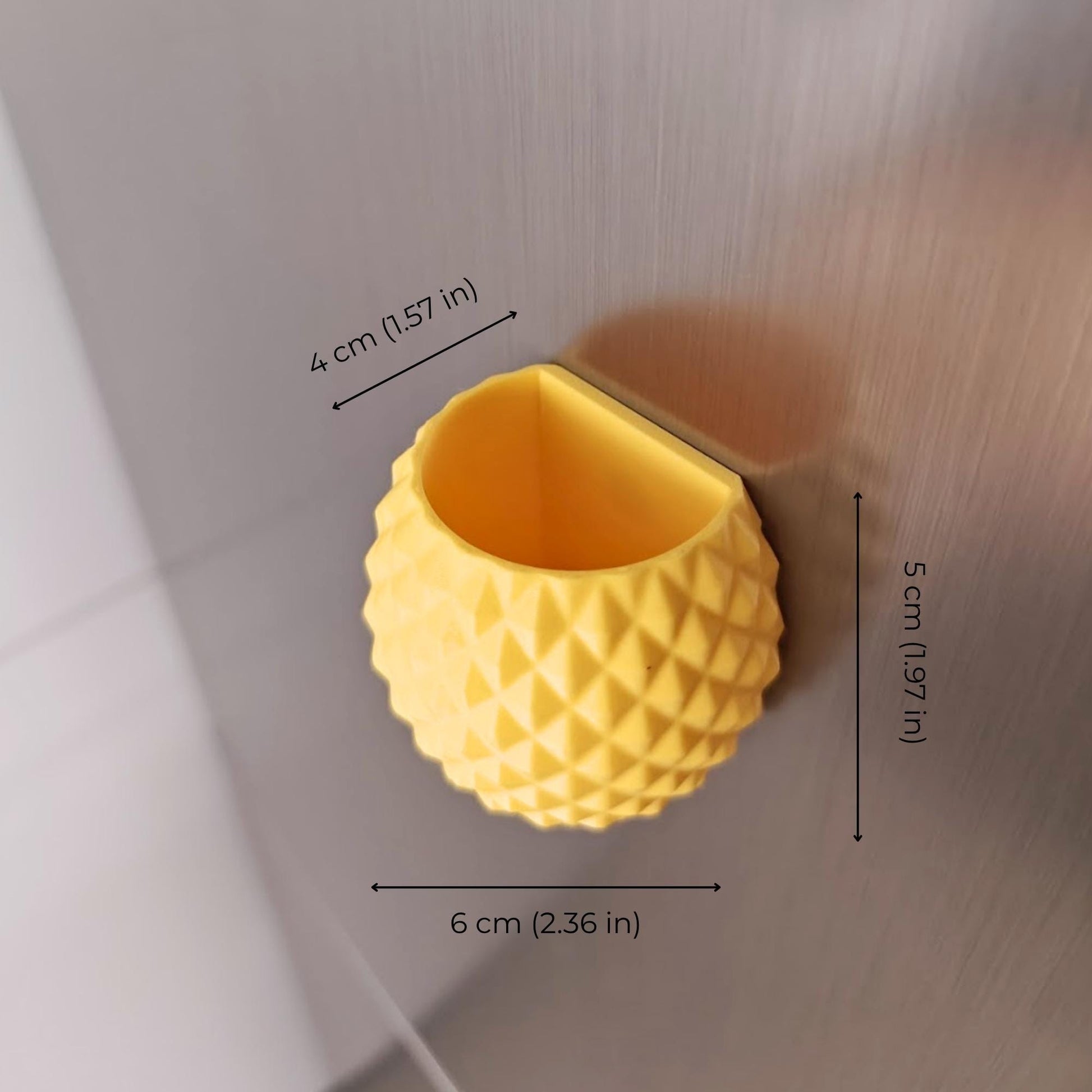 Yellow pineapple magnetic planter showing angled opening and dimensions