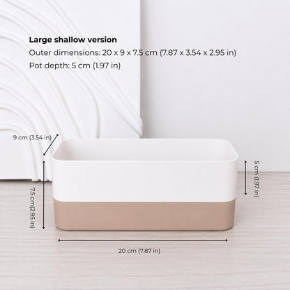 Large shallow rectangular self-watering planter assembled in white and latte brown.