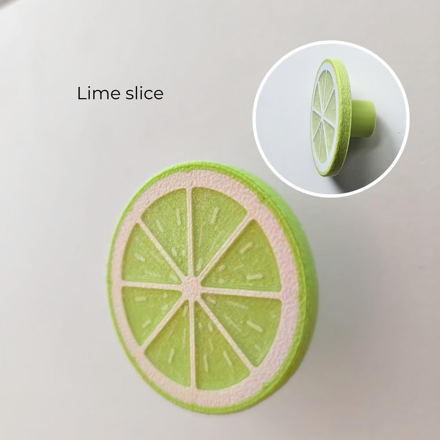 Lime slice citrus knob with flat front design and side profile detail.