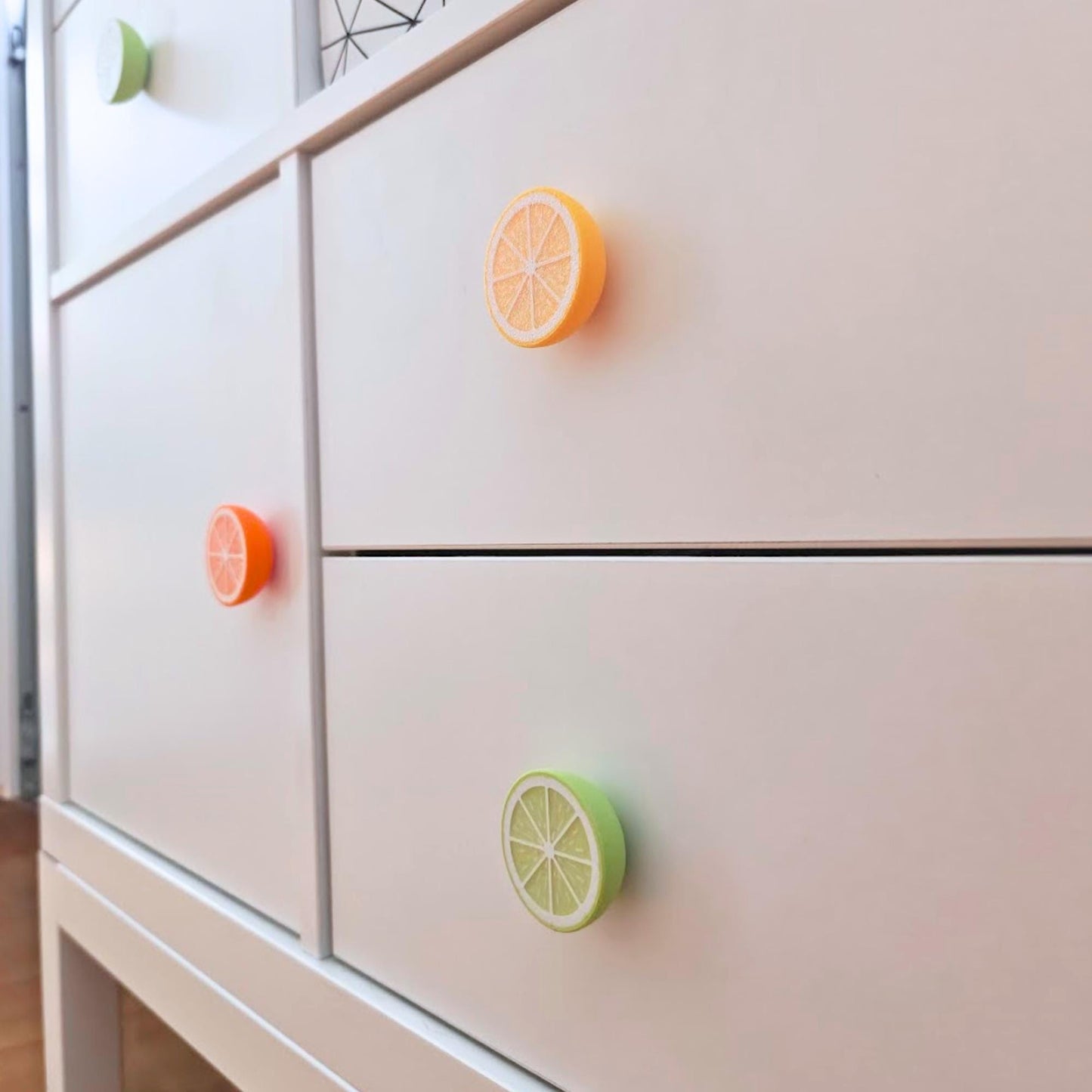 Citrus knobs overview showing rounded and slice designs in lemon yellow, orange, and lime green.