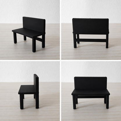 Four-view collage showing the black firefighter command table from front, side, rear, and angled perspectives.