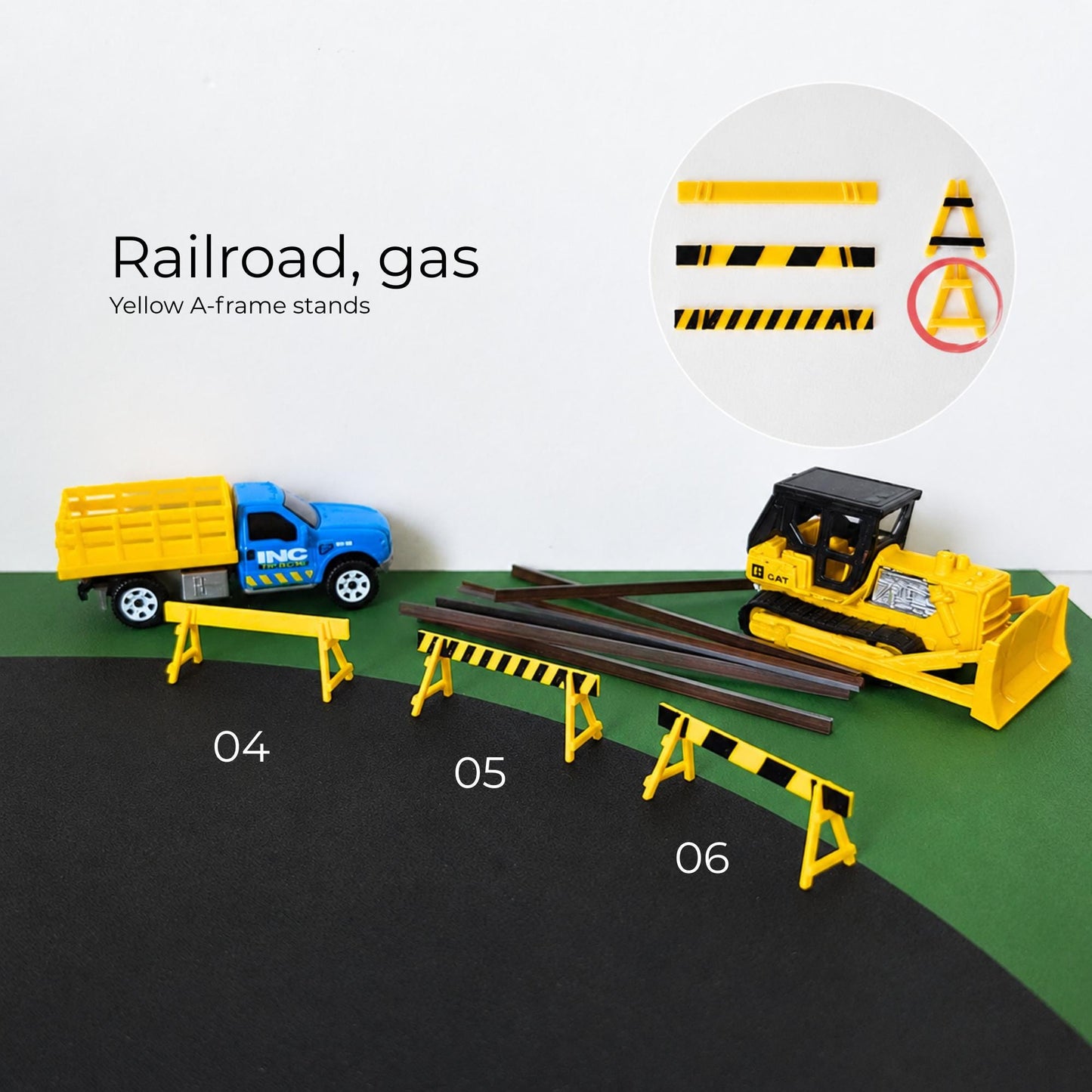 Yellow A-frame railroad barricades with black warning stripes for 1:64 scale construction dioramas