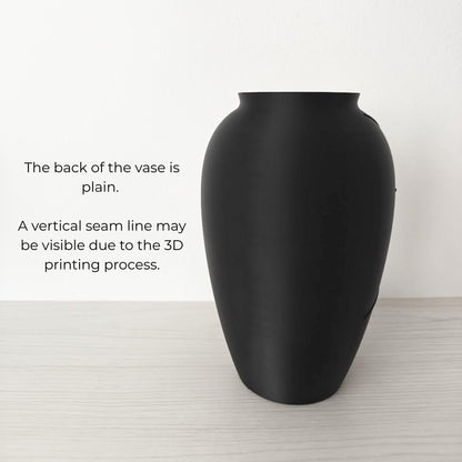 Plain back side of the black vase showing simple smooth design.