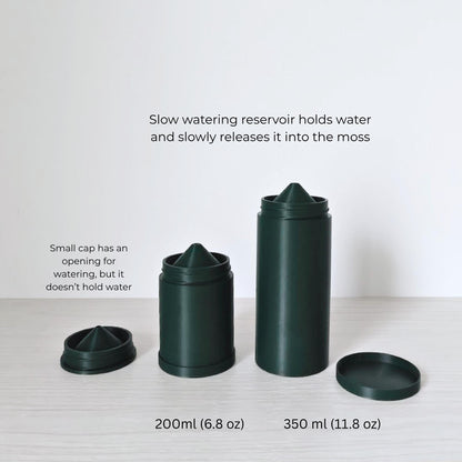 Close-up of watering cap and reservoir for plant hydration. The small cap has an opening. The slow watering reservoir holds up to 200ml or 350 ml of water and slowly releases it into the moss. One reservoir holds 200ml, the other holds 350 ml.