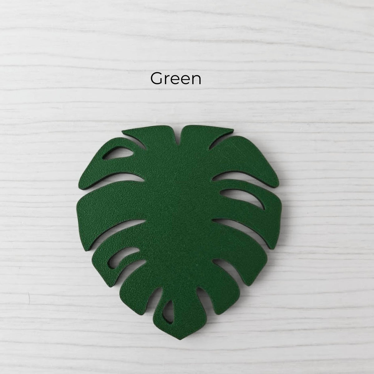 Front view of a Monstera handle - green version