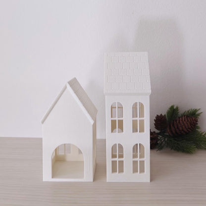 Side view of 3D printed house candle shades with pitched roofs