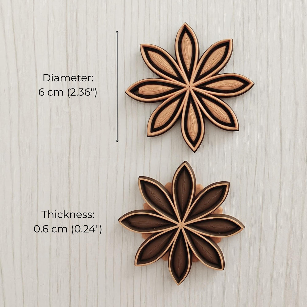 Star anise ornament shown from front and back with diameter 6 cm and thickness 0.6 cm.